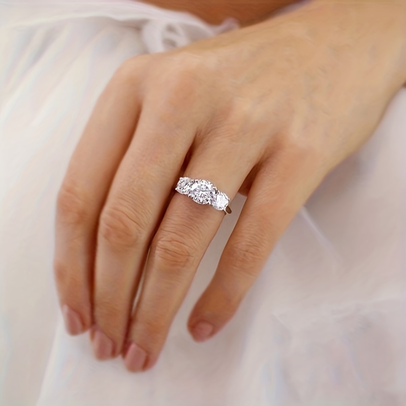 Women's 2/4 Carat Round Moissanite Three Stone Engagement Ring